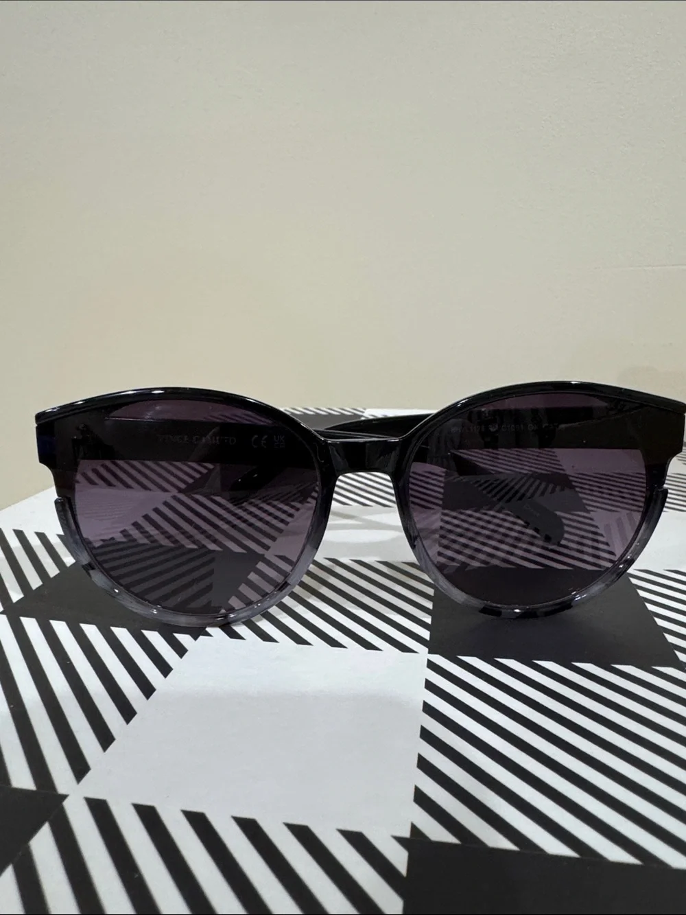 Vince Camuto Black Frame Sunglasses with Dark Purple Lenses
